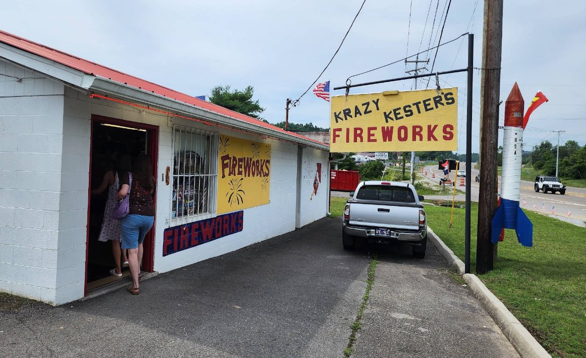 Krazy Kester's Fireworks storefront on Maynardville Highway, with hand-painted signs and a large rocket display out front.